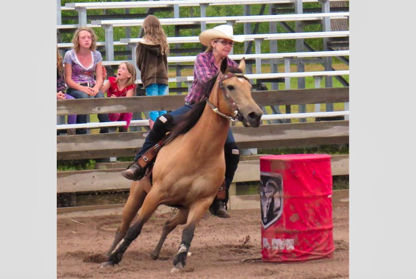 The Western Shore Barrell Racing Association will be at the Shelburne Exhibition Grounds this weekend for some fast-paced action. Pictured is Natalie Snare rounding a barrel in racing competition.