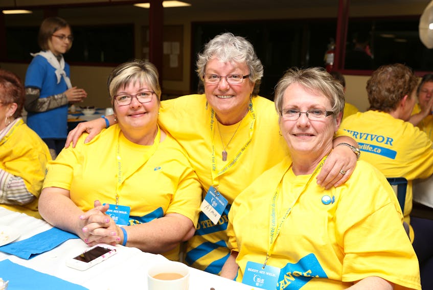 Darlene D'Eon (left) says she gets comfort and healing from celebrating the Relay for Life with friends and fellow survivors Alma Taylor (center) and Gail Harding (right) pictured here at the 2016 relay in Digby.
