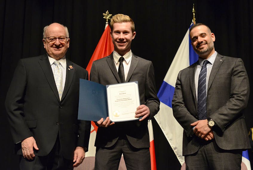 Barrington Municipal High School Student Brett Smith receives the Lieutenant Governor's Respectful Citizenship Award. Smith is pictured with Lieutenant Governor Arthur J. LeBlanc and Education Minister Zach Churchill.