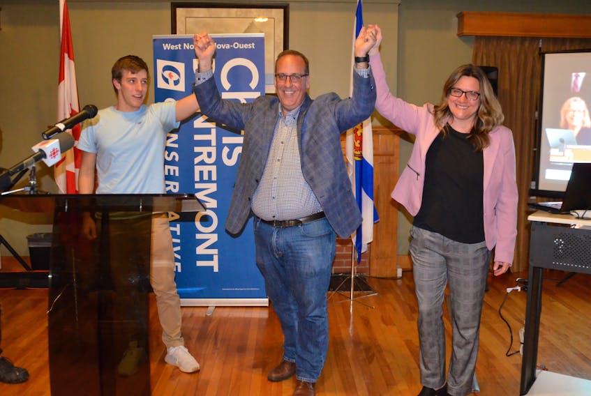 Conservative candidate Chris d'Entremont celebrates his West Nova riding election night win his family. LAWRENCE POWELL PHOTO