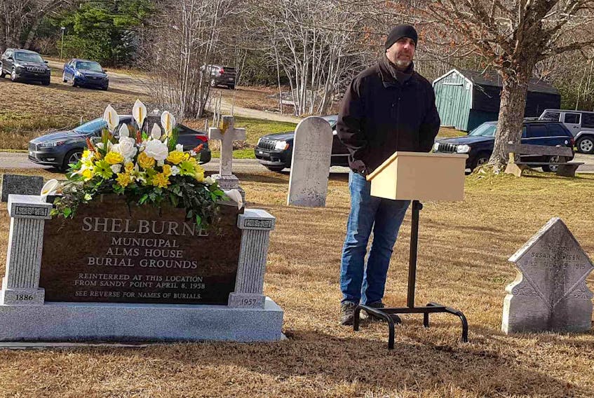 Reverend Ed Trevors says a few words during the unveiling of the new Alms House monument in the Pine Grove Cemetery on Nov. 14.