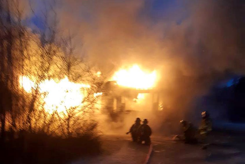 The first line of firefighters off the truck had a blazing inferno facing them at the house fire in Barrington on Jan. 21.