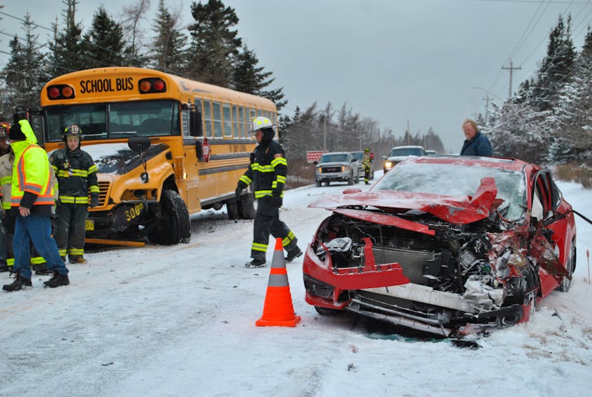 A vehicle and a TCRCE school bus collided on Highway 3 in the Upper Woods Harbour/Charlesville area of Shelburne County on the morning of Jan. 22. The vehicle reportedly lost control on the snow-covered road and the bus and vehicle could not avoid colliding. There were no injuries to students. KATHY JOHNSON PHOTO
