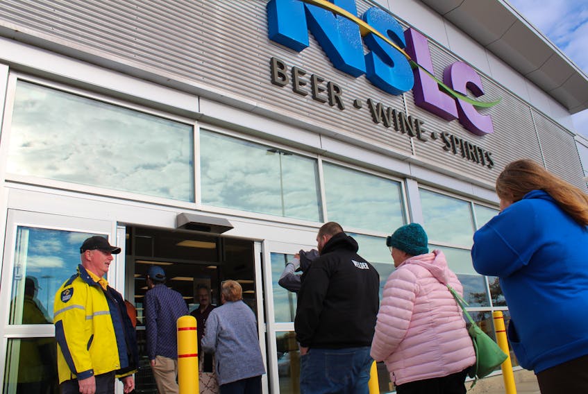 Customers file into the Yarmouth NSLC at 10 a.m., many heading towards the rear of the store where the Cannabis Shop is located.
