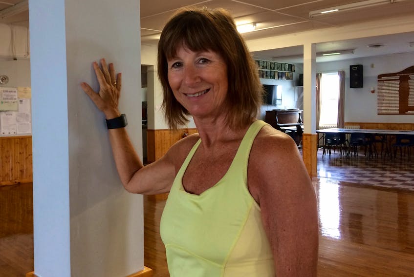 Cindy Robicheau in the Yarmouth Lions Club hall after one of the fitness classes she teaches. She is working her way back after being seriously hurt in a car crash this past April. ERIC BOURQUE
