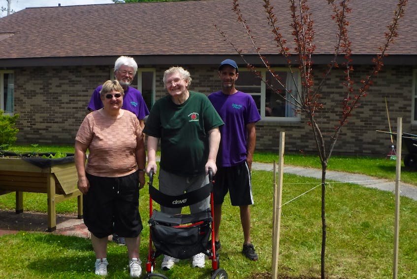 A ceremonial tree planting, as well as a garden party, was held at Roseway Manor on June 1. CONTRIBUTED