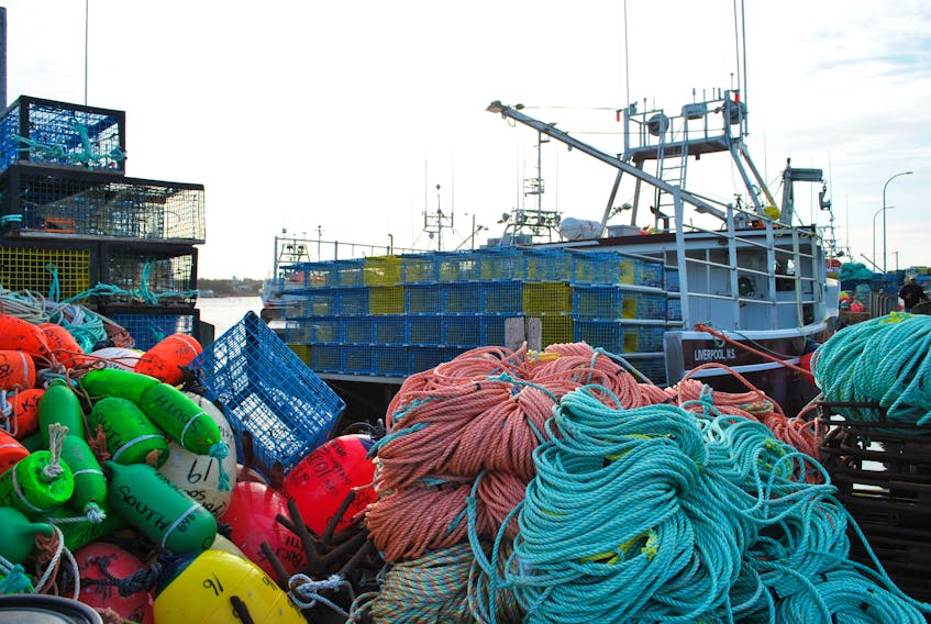 Gear and boats wait for the start of the lobster season at the Falls Point Wharf in Shelburne County.