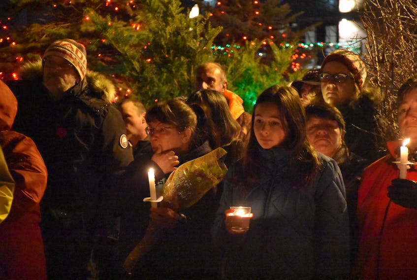 In the wake of a tragedy that claimed the life of a four-year-old girl at Yarmouth's annual Christmas parade of lights, a candlelight vigil was held in Frost Park on Nov. 26. TINA COMEAU PHOTO