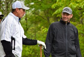 Former NHL player Jody Shelley talks with friend Billy Corbin from Columbus, Ohio, who was one of Shelley’s playing partners at last year’s Jody Shelley Golf Fore Health Tournament at the River Hills Golf and Country Club.