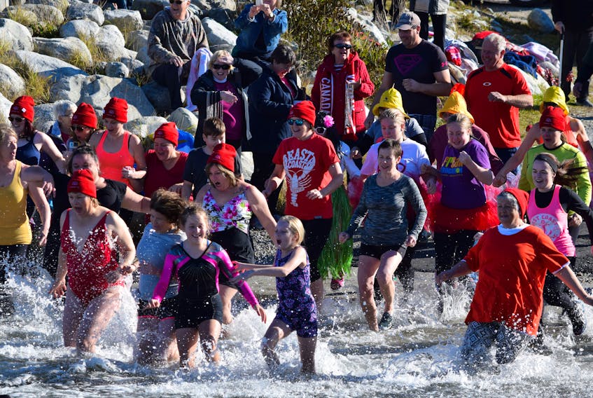 With the words “Ready, set dip!” 44 people race into the water in the North Each Point for the fourth annual Lobster Dip on Nov. 25. The event is a fundraiser for the Barrington Municipal High School Me To We team, which is heading to South Africa during March Break. A total of $507.50 was raised for the cause.