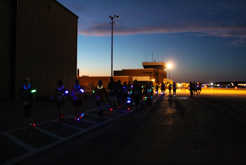 Runners and walkers made a colourful sight on Sept. 8 at the Yarmouth airport, with shoe clips and arm bands supplied by Starlight Runway Run organizers.