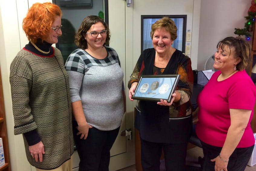 From left: Nicole Carmont-Coulombe, area manager with Lifestyle Hearing; Shauna MacCallum, audiologist at the Hearing Health Care Unit of Southwest Nova Ltd. in Yarmouth; retiring audiologist Sheila Nichols; Marie-Josée Deveau, patient co-ordinator, Hearing Health Care Unit of Southwest Nova Ltd. Nichols is holding a gift she received from the Town of Yarmouth during a Nov. 22 ceremony in her honour. She also received an award from Lifestyle Hearing and a certificate of appreciation from Yarmouth MLA Zach Churchill (which was presented on Churchill’s behalf by Yarmouth town council member Wade Cleveland.)