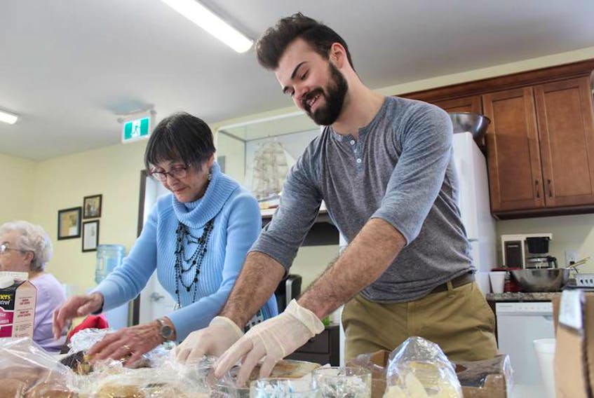 Shirley Deveau and Andre Michel preparing lunch at the HOPE Centre this past January as part of Yarmouth’s inaugural 100 Meals initiative. The project is being undertaken a second time, starting Dec. 3, and the HOPE Centre is the kickoff location.