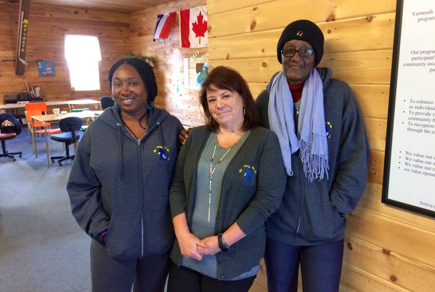 Sherry Robertson, executive director of Yarmouth Life Skills, is flanked by Latoya Merchant (left) and Patricia Mary Clarke, both of whom live in Saint Kitts and Nevis, where they work with people with disabilities. The two came to Yarmouth in late December to spend a few weeks.