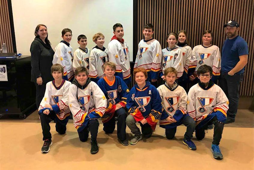 The Clare Acadiens Peewee C hockey team is among the top 10 semifinalists for the Chevrolet Good Deeds Cup. From left, back row: team manager Rosette Comeau, Zachery Belanger, Christian Doucet, Jayden Belliveau, Stephen Murphy, Marcel Lowe, Colby Haight, LoLo Choat, Daniel Gilliatt and coach Gilles Saulnier. Front row: Isiah Rhyno, Jakob Goulden,  Noah Saulnier, Isiah Manzer, Damien Mullin  and Orion Comeau.