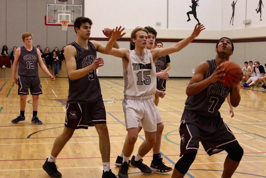 The host Vikings are on offence during a game against Northeast Kings Education Centre, part of the YCMHS invitational senior boys basketball tournament held Jan. 18-19. Yarmouth players pictured here (from left): Noah Wilcox (number 12), Dylan Landry (9), Dawson Mills (11, partially obscured), Randal Fells (7).