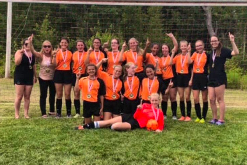 The Digby Tigers U15 soccer team after winning their division of the Gunn Baldursson tournament. Back row, from left: Abbey Thomas, assistant coach, Amy Theriault, head coach, Alexa Custance, Macayla Stanton, Camryn Gidney, Calli Amero, Hannah Theriault, Raven Cromwell, Ella Moore, Lauren Sollows, Payton Tupper, Andrea Williams, assistant coach. Front row, from left: Dakota Stewart, Karly Leblanc, Gemma Moore, Holly Hasselbring and keeper Madison Brown.