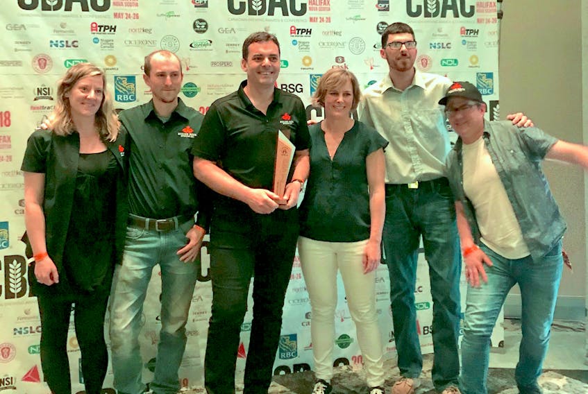 Sheila Bird (from left), Adam Roscoe, Henry Pedro, Emily Tipton, Nick Williams and Andrew Cooper were on hand to accept the silver award in the North American Style Amber/Red Ale category with their Temptation Red Ale at the Canadian Brewing Awards in Halifax on May 26.