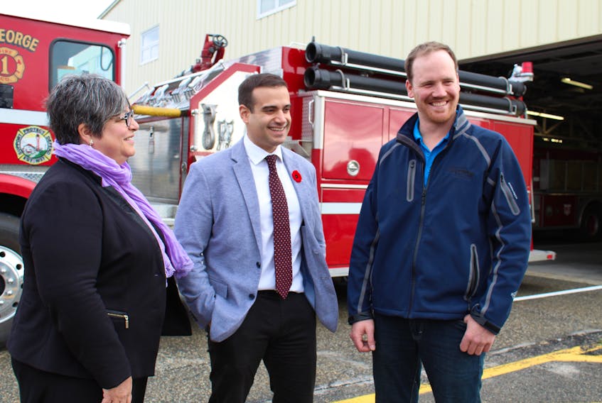 Yarmouth Mayor Pam Mood, Yarmouth MLA and Education Minister Zach Churchill and Andrew MacKenzie, T & D supervisor with Nova Scotia Power for Yarmouth, Barrington and Shelburne were at a Nov. 10 announcement of a provincial program for solar electricity. ERIC BOURQUE