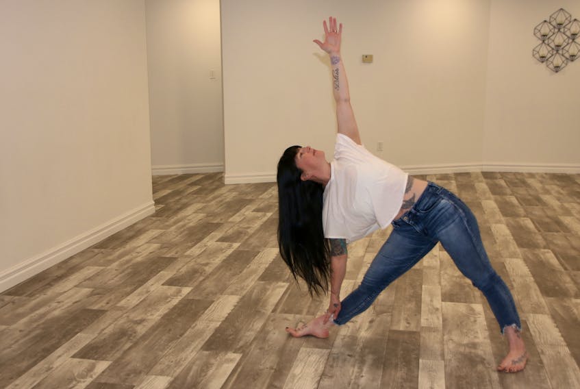 en Collins recently opened Yoga East in the former Body Solace studio. She’s been doing yoga for about 20 years and it’s helped her both physically and emotionally.