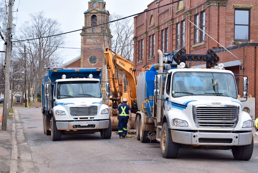 A small part of Young Street was blocked off Wednesday as road crews worked to replace a failed catch basin outside the Truro Farmers Market. One of the concrete rings in the basin had failed, leading to the Public Works department to replace the whole unit.