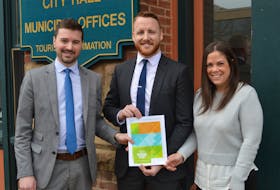 Members of Charlottetown's youth retention advisory board, from left, Zac Murphy, Alex Youland and Lydia Peters, released the findings of its youth affordable housing survey on Thursday.