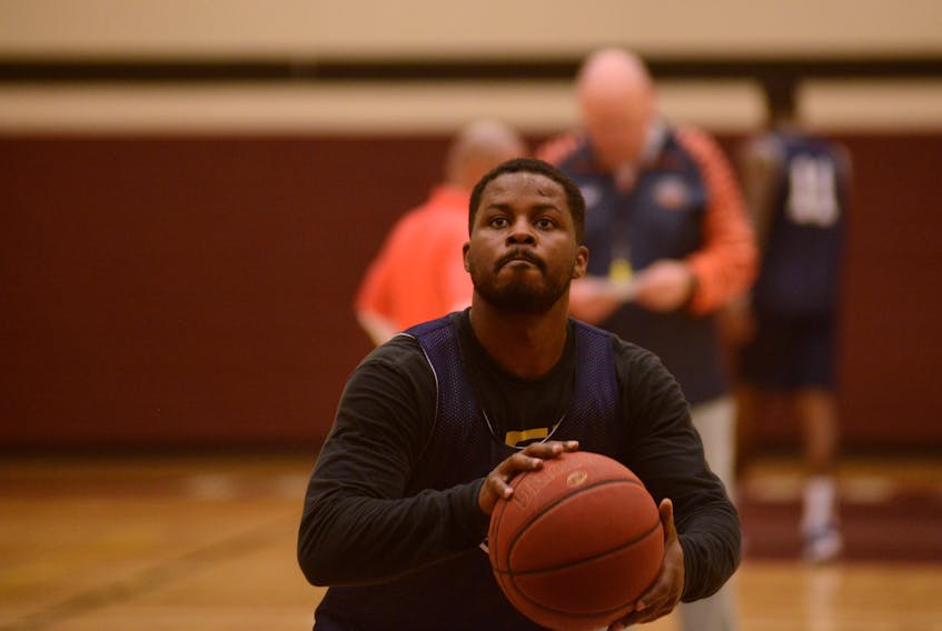 Island Storm point guard Andre Stringer takes a free-throw during a practice in 2017.