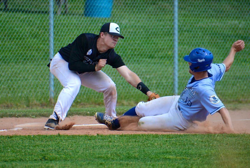 Charlottetown Gaudet's Auto Body Islanders third baseman Grant Grady tags out Corey Wood of the Fredericton Royals after he was caught stealing Saturday during New Brunswick Senior Baseball League action at Memorial Field.
