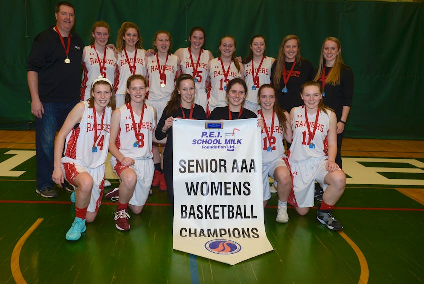 The Charlottetown Rural Raiders won the Prince Edward Island School Athletic Association Domino’s senior AAA girls’ basketball banner Tuesday at UPEI. Team members are, front row, from left, Emma Stanley, Anna Brazil, Sydney Whitlock, Emma Seviour, Amy Plaggenhoef and Jenna Cyr. Second row, head coach Peter Lawlor, Abby McGeoghan, Taylor Mitton, Julia Freeburn, Bryn Essery, Jaelyn Power, Devon Lawlor, assistant coaches Brooke Johnston and Nicole Davies. Jason Malloy/The Guardian