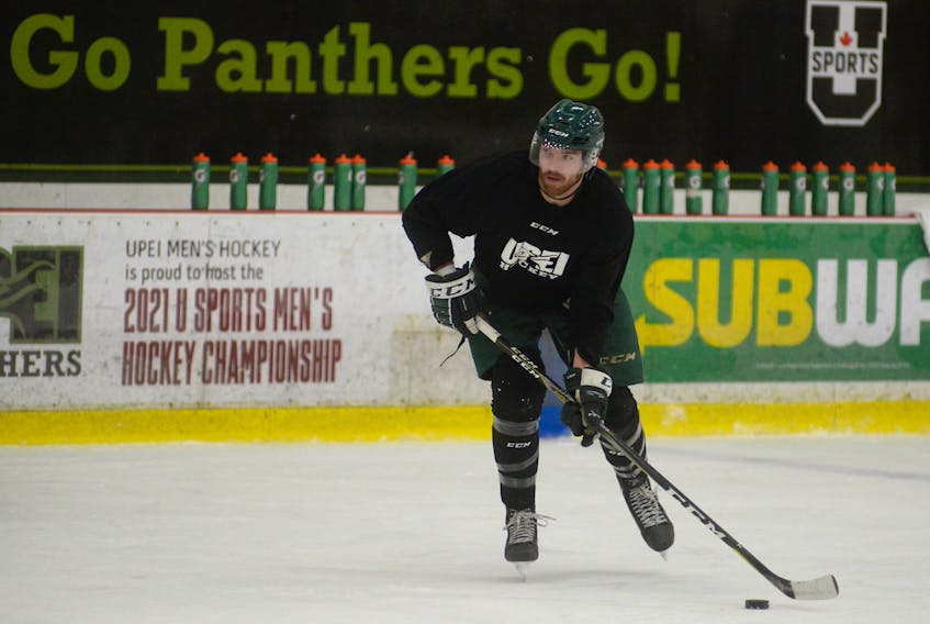 UPEI Panthers third-year defenceman Tanner McCabe prepares to fire a shot on net during Wednesday’s practice at MacLauchlan Arena.