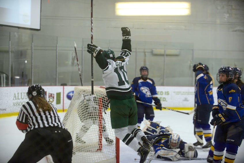 UPEI Panthers forward Taylor Gillis jumps in the air after scoring the series-winning goal in overtime Tuesday against the Unversité de Moncton at MacLauchlan Arena.