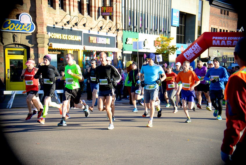 Participants in the Dairy Farmers of Canada half marathon run start their race as part of the P.E.I. Marathon early Sunday morning in downtown Charlottetown.