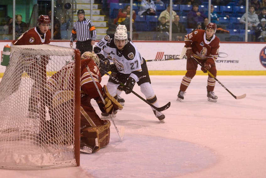 Charlottetown Islanders winger Gaetan Jobin watches as his shot is deflected over the net by Acadie-Bathurst Titan goalie Felix-Anthony Ethier Sunday during Quebec Major Junior Hockey League action at the Eastlink Centre.