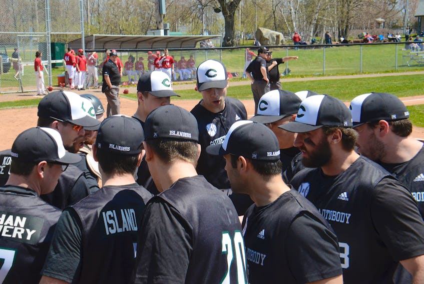 The Charlottetown Gaudet’s Auto Body Islanders prepare to take the field during a senior baseball game at Memorial Field this summer.