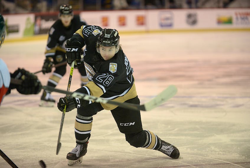 Charlottetown Islanders winger Drew Johnston fires a shot off a faceoff against the Halifax Mooseheads on Nov. 18, 2020.