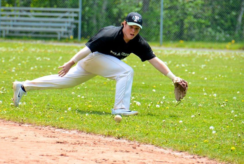 P.E.I. Junior Islanders second baseman Ryne MacIsaac tries to knock down a hot shot through the right side of the infield Saturday at Memorial Field.