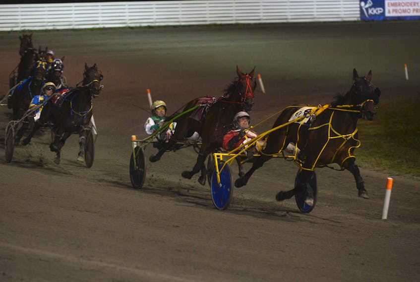 Stature Seelster, with Dave Dowling doing the driving, catches some air while leading the field in the mayor’s pace in Race 9 of Saturday’s harness racing card at Red Shores at the Charlottetown Driving Park. I C True Grit and driver Mike McGuigan won the race in 1:57.4.