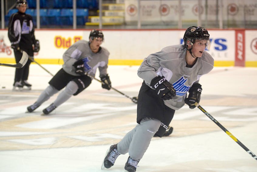Derek Gentile, right, and his Charlottetown Islanders teammates are looking forward to Friday’s first game of the Quebec Major Junior Hockey League regular season.