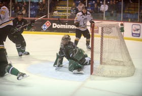 Charlottetown Islanders goalie Matthew Welsh slides across the crease to make a pad save during the second period of Friday's game with the Cape Breton Eagles at the Eastlink Centre. Welsh became the Quebec Major Junior Hockey League's all-time minutes played leader by a goalie midway through the third period.