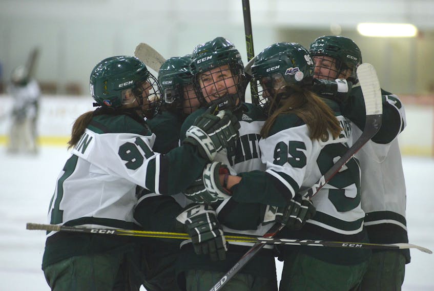 The UPEI Panthers celebrate Sophie Vandale's goal in the first period of Sunday's game with the Saint Mary's Huskies. From left are Jenna Pellerin, Katelynn Nice, Vandale, Faith Steeves and captain Rachel Colle.