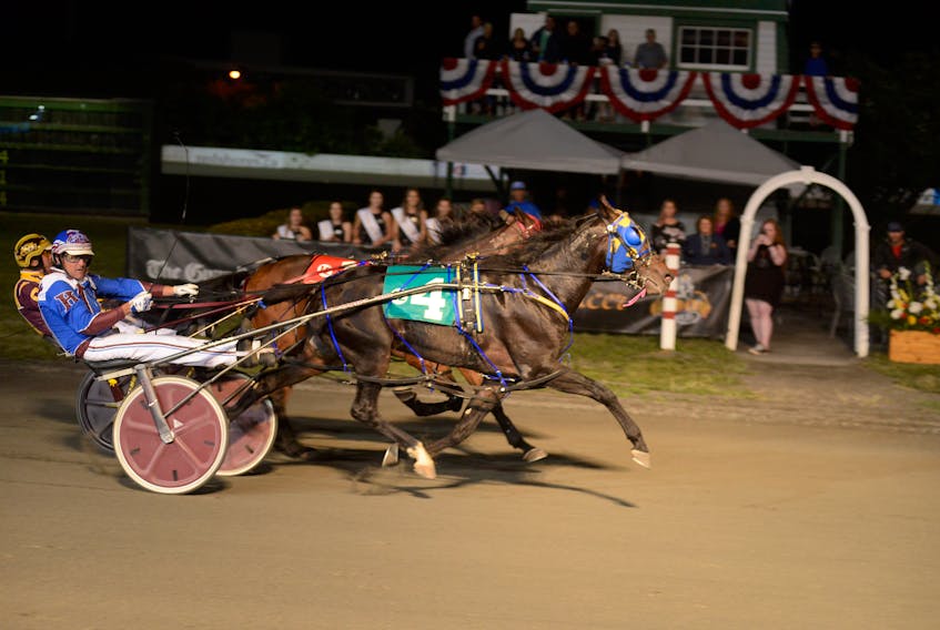 Jason Hughes drove Sir Pugsley to the finish line first Monday in The Guardian Gold Cup and Saucer Trial 2 at Red Shores at the Charlottetown Driving Park.