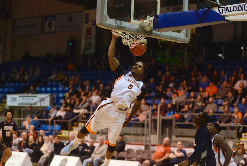 Island Storm forward Robbie Robinson slams the ball during the fourth quarter of Saturday's National Basketball League of Canada contest with the St. John's Edge at the Eastlink Centre.