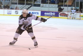 Charlottetown Islanders captain Brendon Clavelle fires to blast a shot on net during the 2019-20 Quebec Major Junior Hockey League regular season.