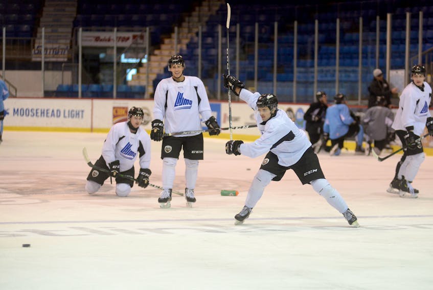 Defenceman Noah Laaouan prepares to one-time a pass during Charlottetown Islanders practice Tuesday at the Eastlink Centre.
