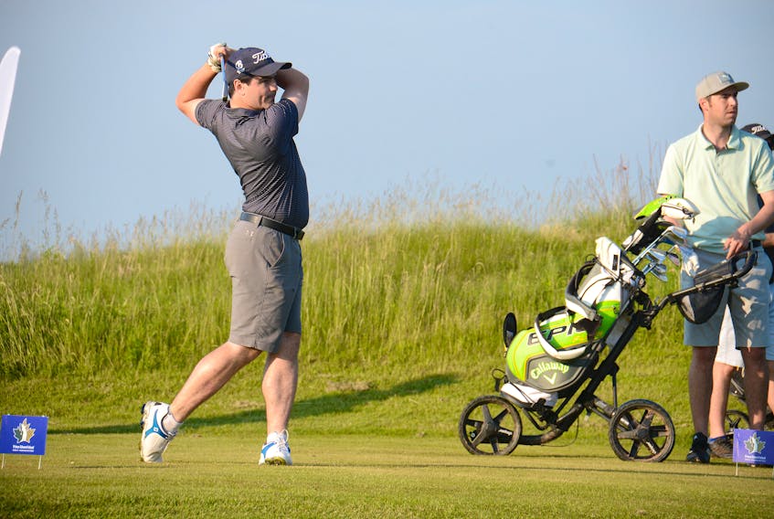 Charlottetown’s Curtis Hall watches his tee shot Friday from the first hole at Eagles Glenn of Cavendish.