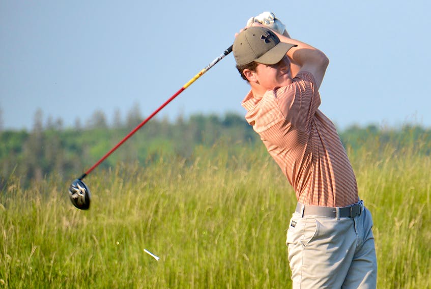 Justin Caron tees off at a golf championship earlier this summer.