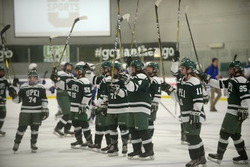 The UPEI Panthers salute the fans after their first game of the U Sports women's hockey championship Thursday at MacLauchlan Arena.