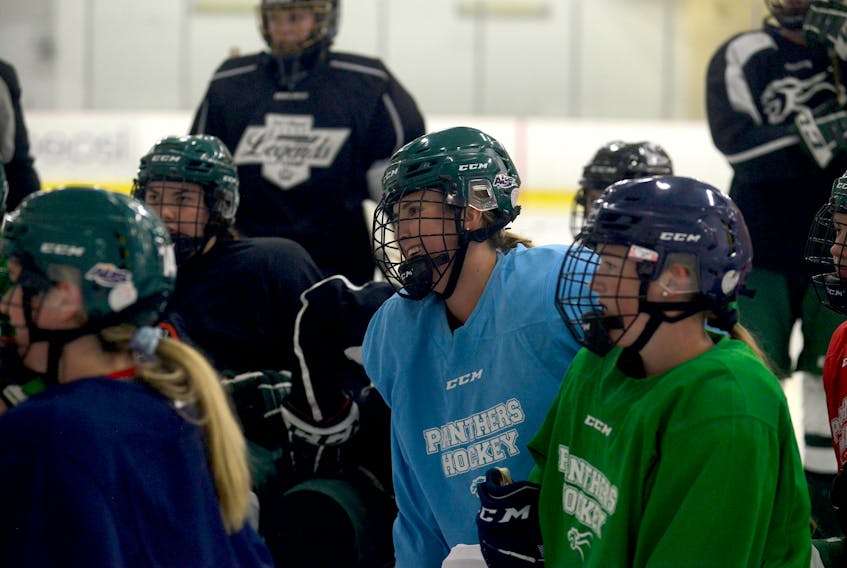 The UPEI Panthers women's hockey team listens to a drill during practice as the team prepares for the 2019-20 Atlantic University Sport pre-season.