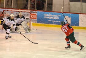 Charlottetown Islanders goalie Colten Ellis prepares to stop a shot from Halifax Mooseheads forward Elliot Desnoyers Friday during Quebec Major Junior Hockey League action at the Eastlink Centre in Charlottetown.