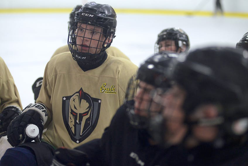 Forward Gabe Hartlen listens to a drill during a Charlottetown Bulk Carriers Knights practice at MacLauchlan Arena. The major midget team opens the regular season tonight by hosting the Kensington Monaghan Farms Wild.